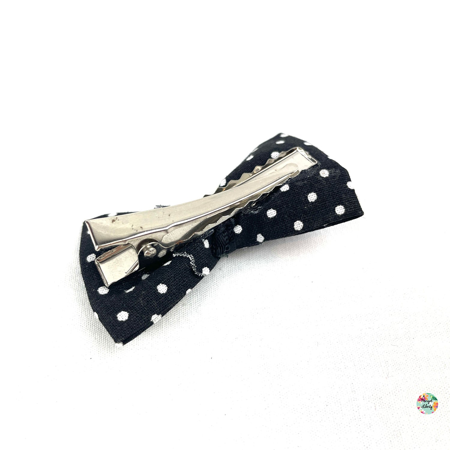 Barrette noire pois blancs