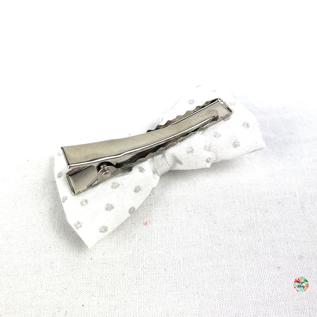 Blanche pois argentés