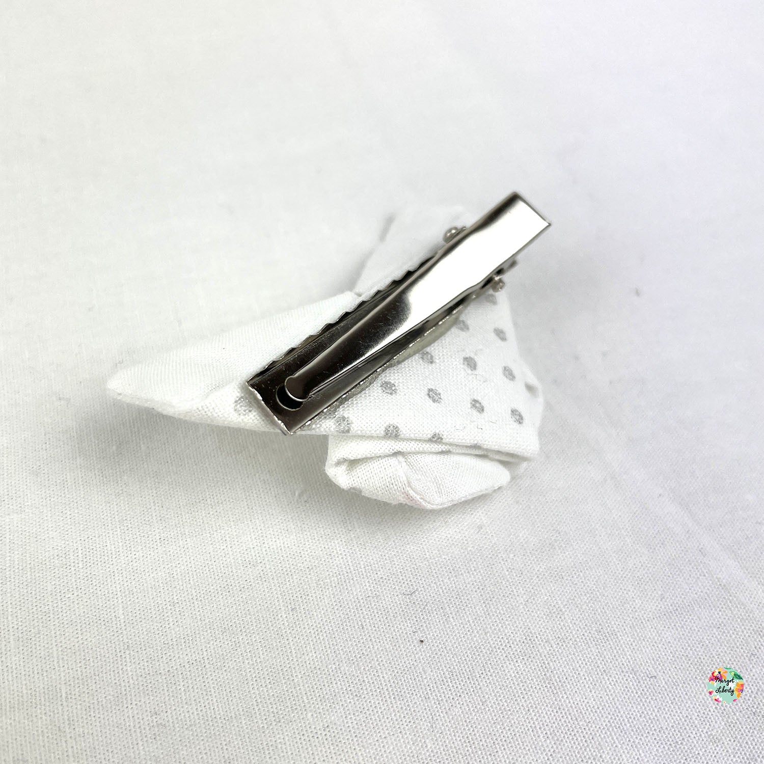 Blanche pois argentés