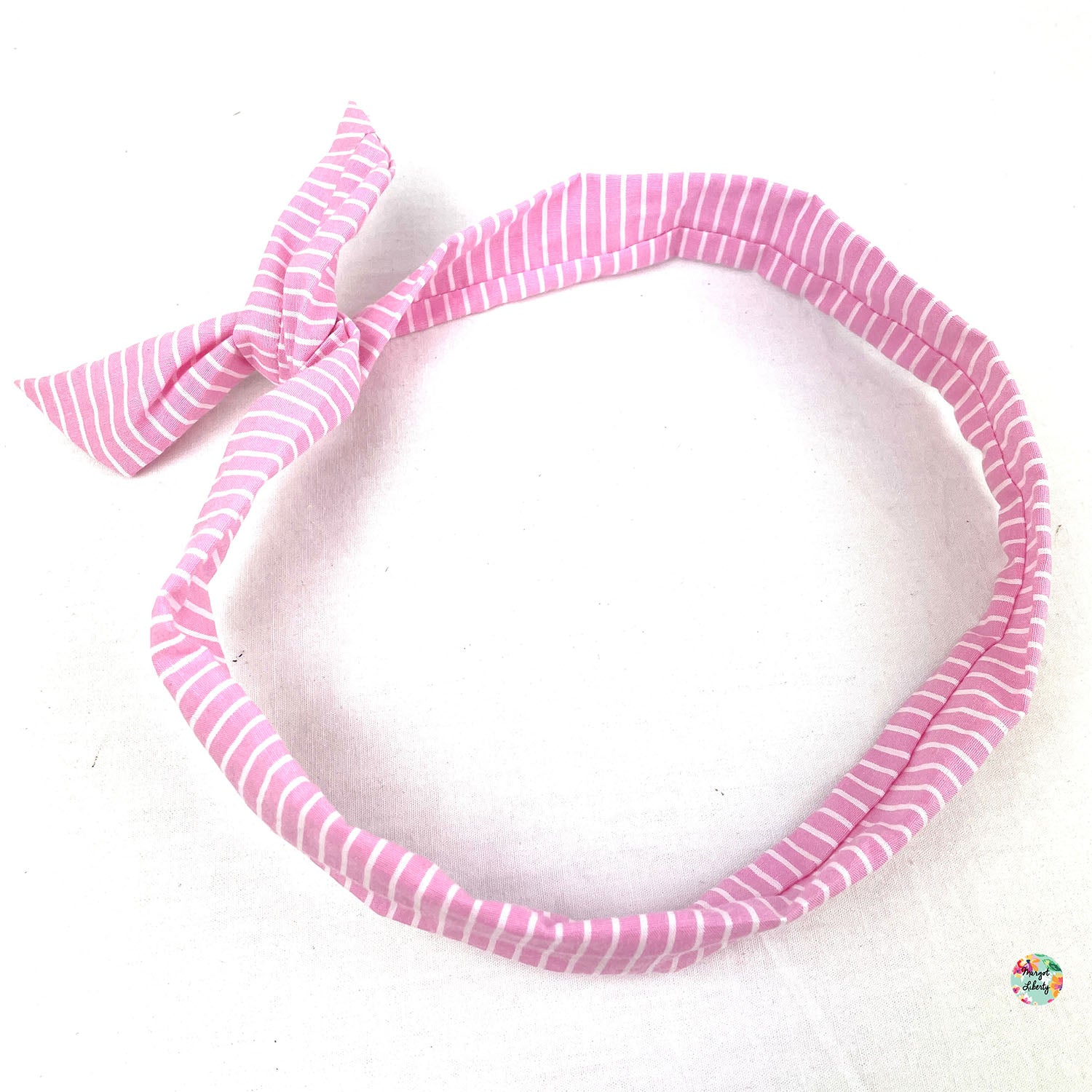 Bandeau "Twist" Rayures roses et blanches