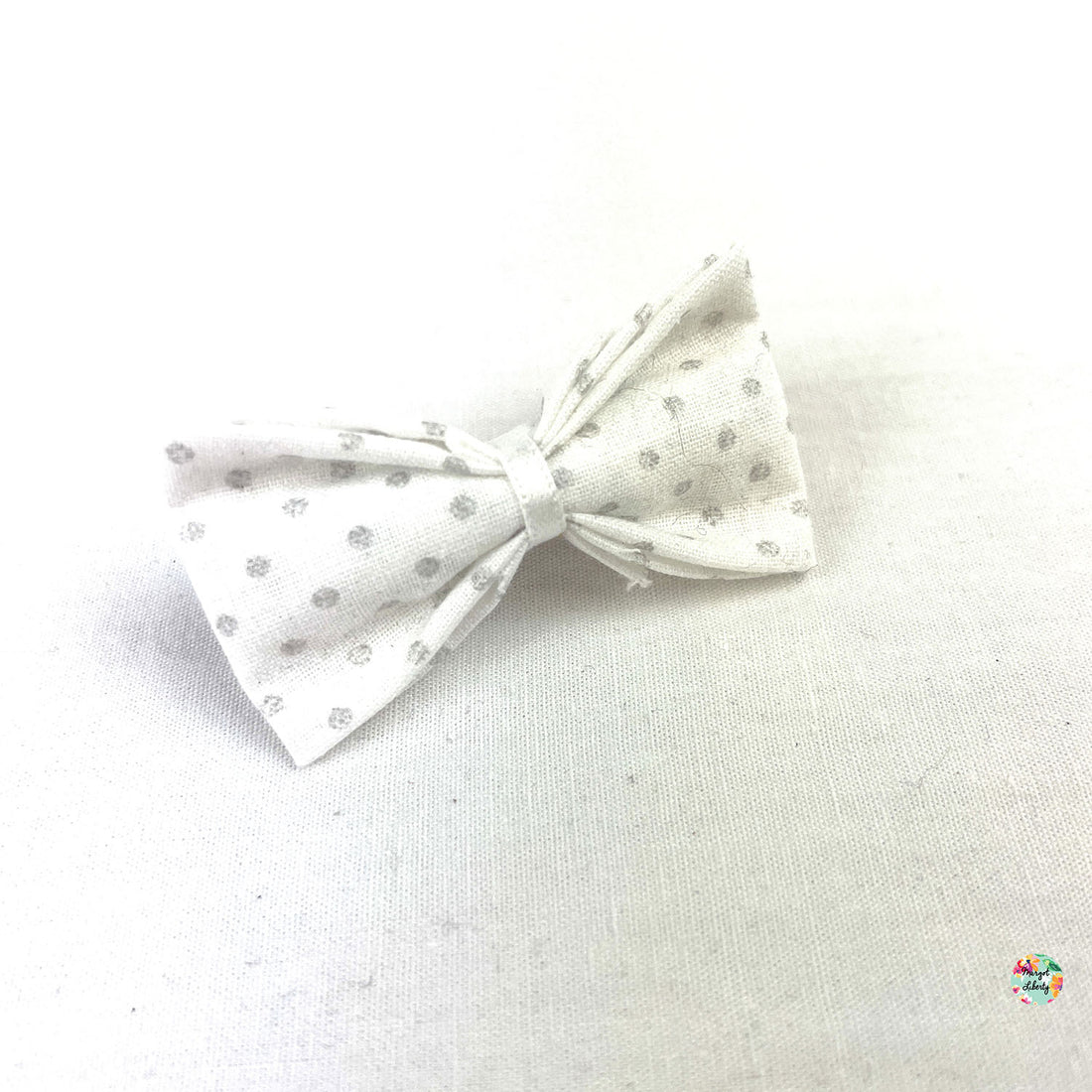 Blanche pois argentés